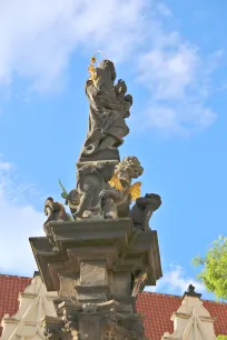 Statue of St. Joseph holding the baby Jesus on Charles Square in Prague